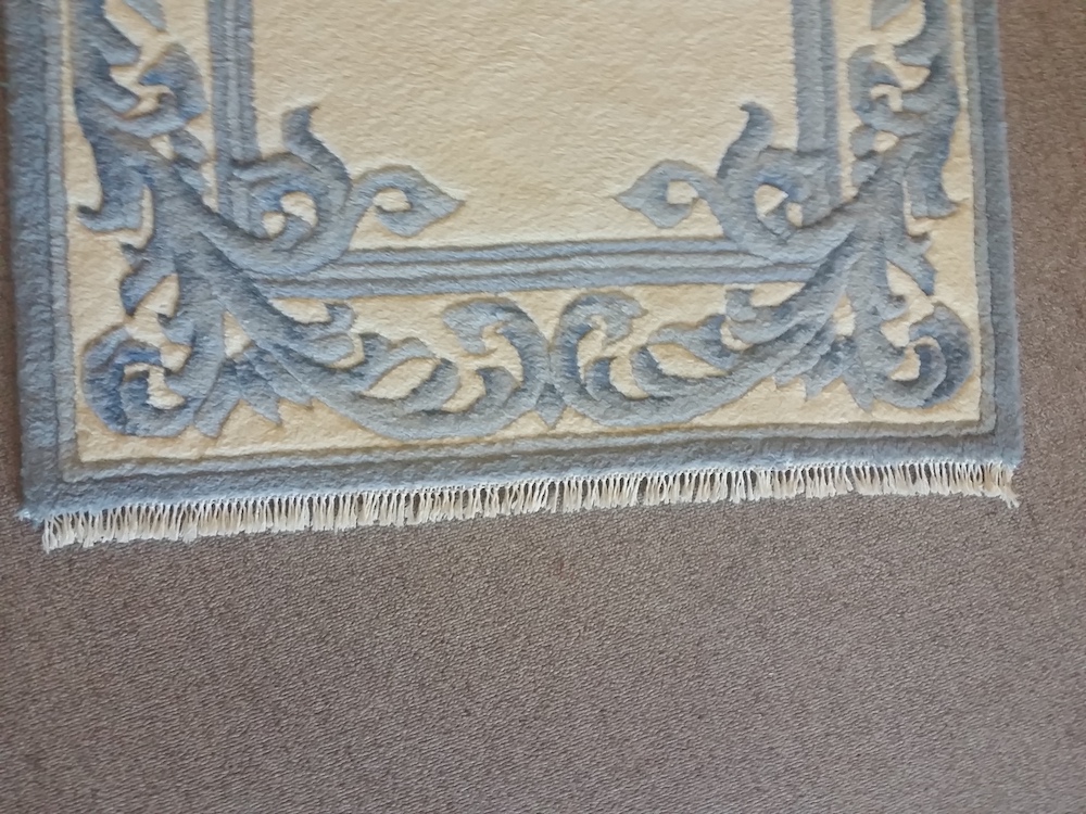 fringe repair on area rug after