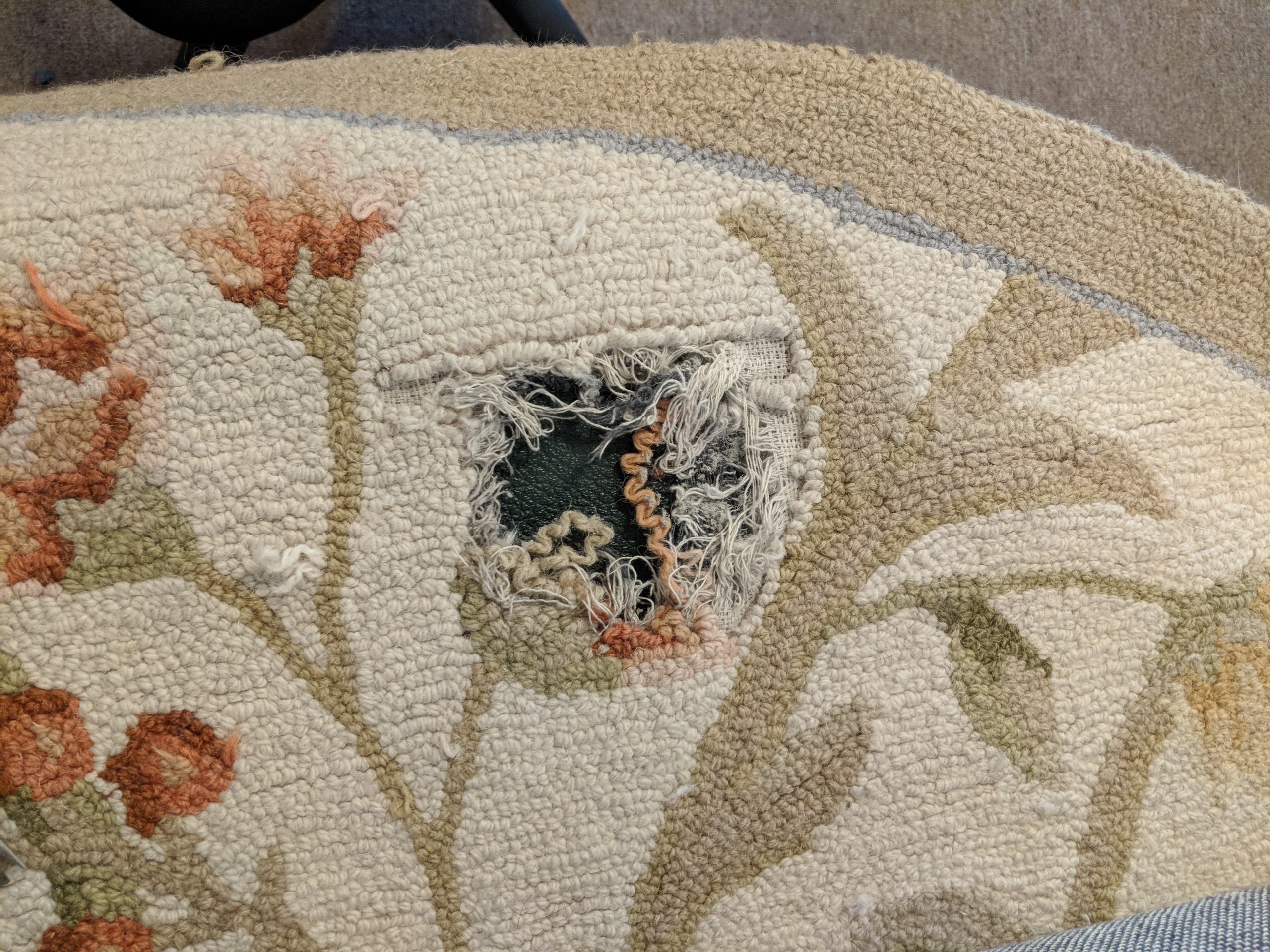 hole in area rug
